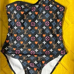 Stylish Women's One-Piece Swimsuit - Black, Orange, and Blue